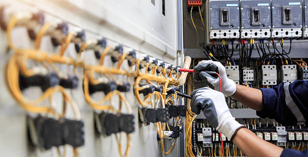 Professional Electrician technician working in Brookside, DE